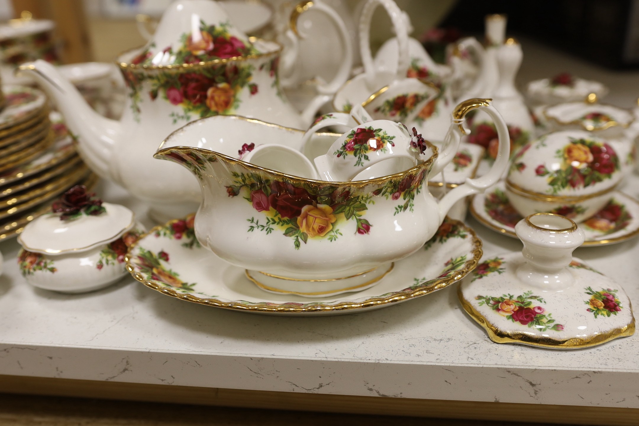 A collection of Royal Albert Old Country Roses tea and dinner service including a collection of vases, pots etc